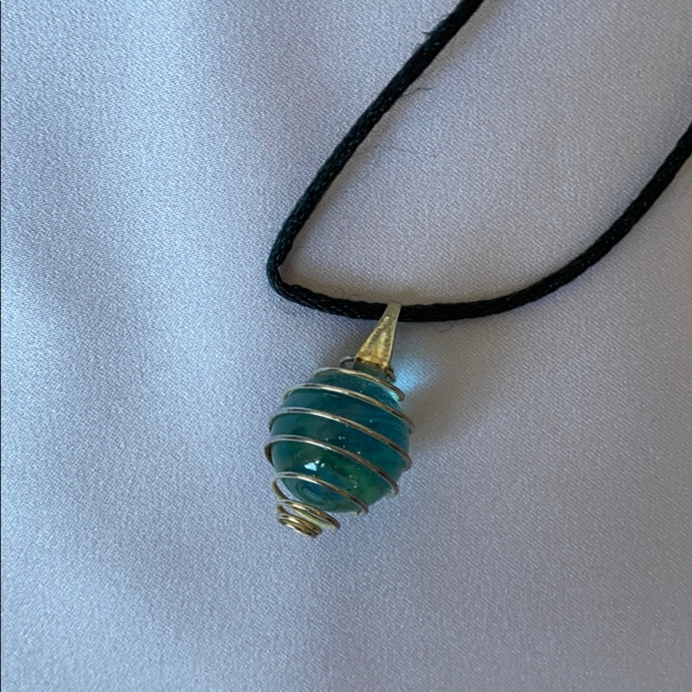 Soft blue stone wrapped with silver wire Necklace